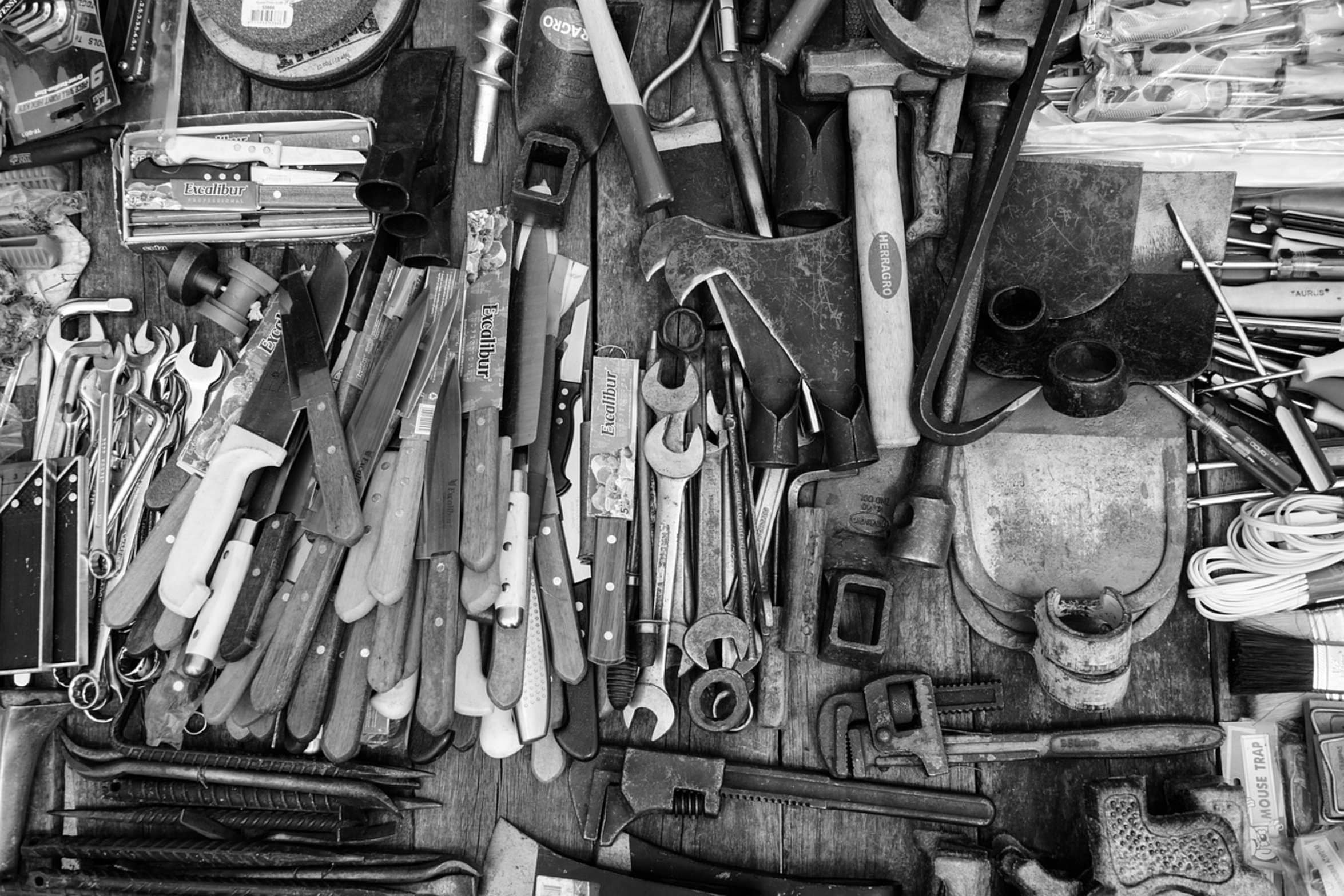assorted cleaning tools on table assorted cleaning tools on table